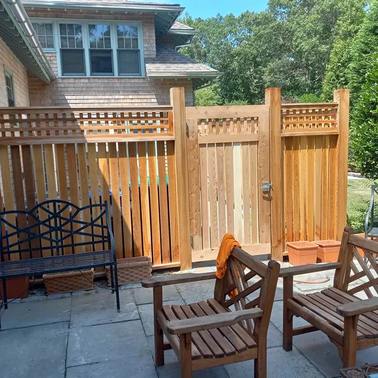 a wood fence with a gate